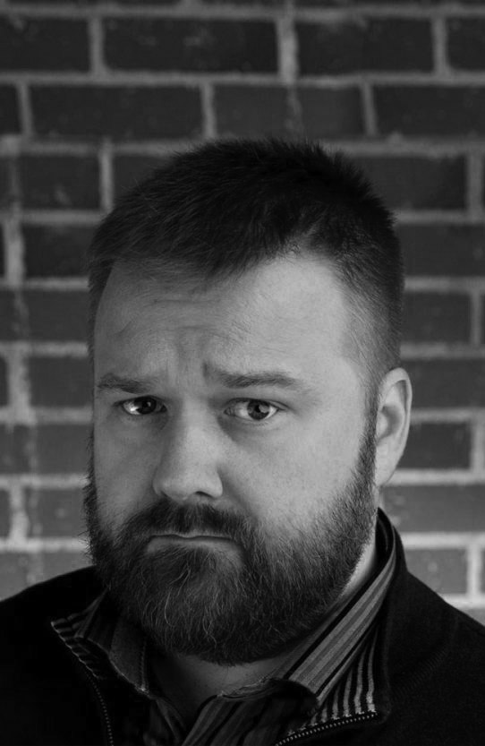 Photo of Robert Kirkman with black and white background